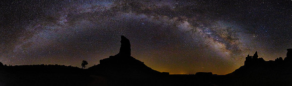 The Milky Way arch over the Valley of the Gods, UT.  Rocks were deposited by the shallow sea that covered this area about 250 million years ago.