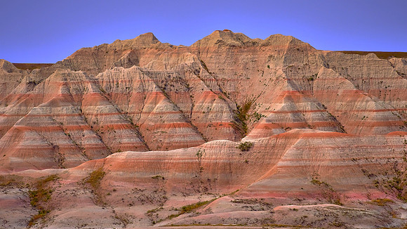 Red bands are Eocene and Oligocene (56-23 mya)  paleosols (old dirt) in Badlands National Park, SD