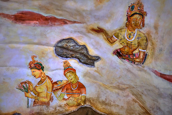 Sigiriya is covered by frescoes originally depicting over 500 Cloud Maidens, Sri Lanka