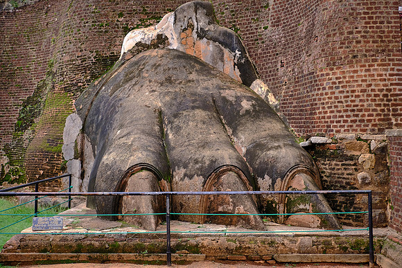 The Lion's Paw and part of the entrance to the Sigiriya fort halfway up the top of Lion Rock, Sri Lanka