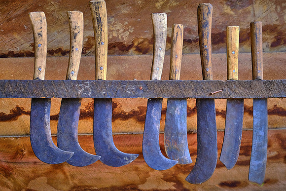 Knives are fashioned from discarded roadside scrap metal.
