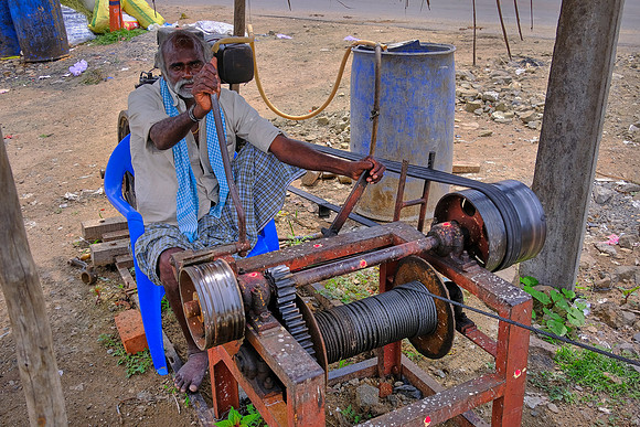Roadside heavy-equipment operator.