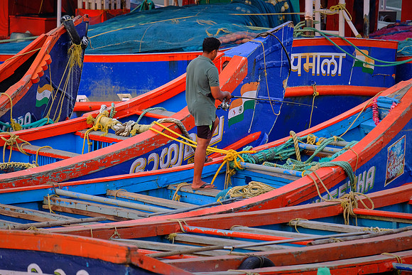 Fishing boats along the shore of Kochi, India.