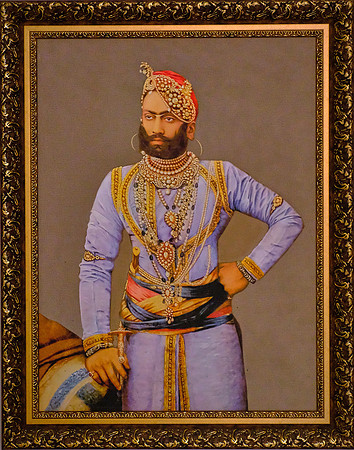 One of the boys all dressed up, City Palace, Udaipur, Rajasthan, India.