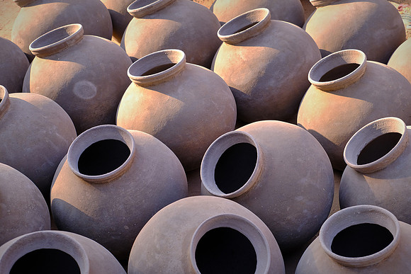 Throwing pots in rural Rajasthan, India.