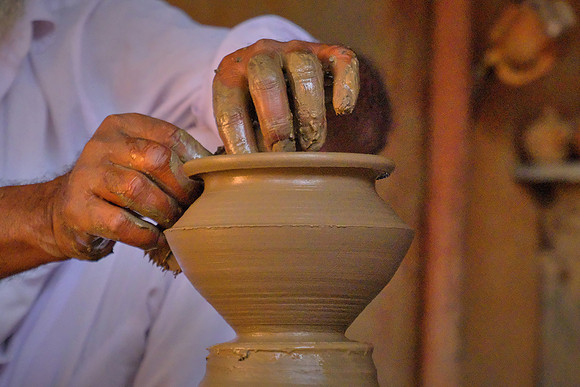 Throwing pots in rural Rajasthan, India.
