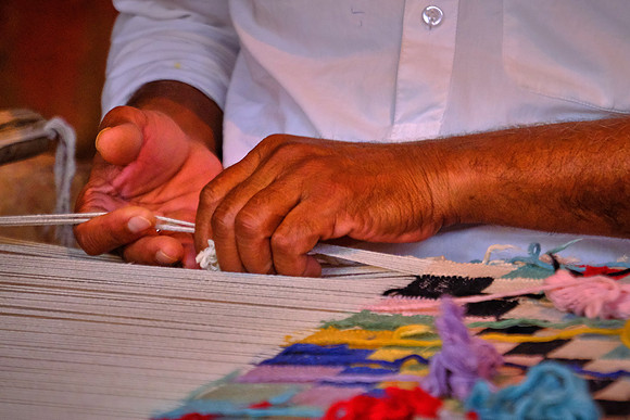 Rug weaving  in rural Rajasthan, India.
