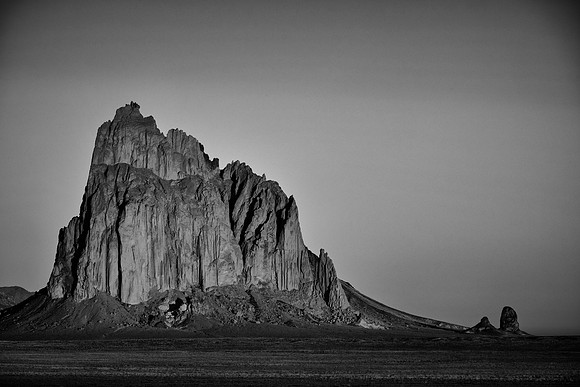 Sunrise at Shiprock: a monadnock rising 1,583 feet above the high-desert plain of the Navajo Nation, New Mexico.
