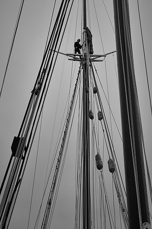 Deckhand Johana atop the foremast, Windjammer Angelique, Camden, Maine