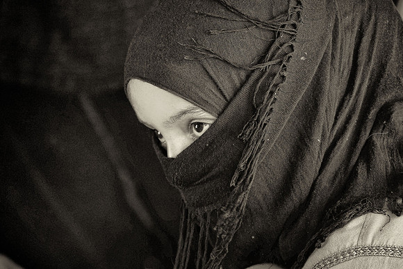 Nomad daughter-in-law spinning wool, Sahara Desert, High Atlas Mountains, Morocco