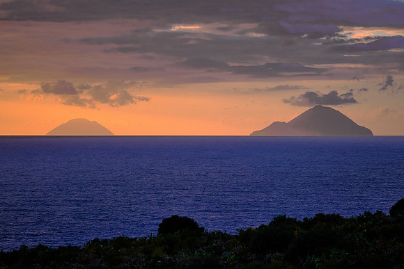 Sunset over Stromboli (left) and Panarea (right) from the island of Salina.