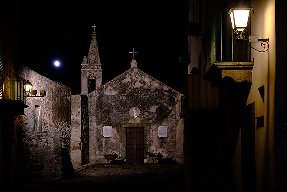 Full moon over ancient church on Lipari Island.