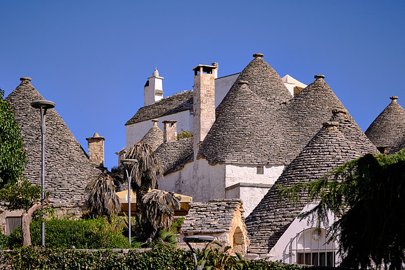 The roofs had decorative pinnacles with  the signature of the architect.