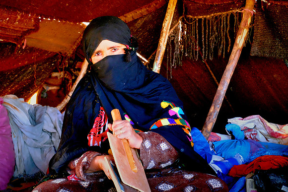 Nomad wife carding wool, Sahara Desert, High Atlas Mountains, Morocco