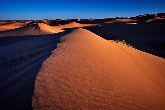 Sunset over the Erg Chebbi dunes, Merzouga, Sahara Desert, High Atlas Mountains, Morocco