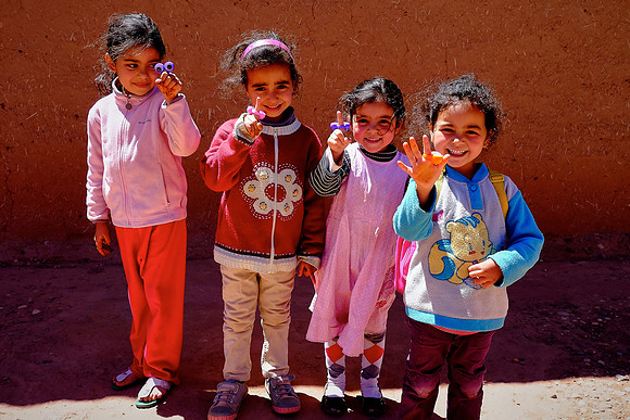 Locals with new finger eye-balls — Kasr of Aït Benhaddou, UNESCO World Heritage Site, Morocco