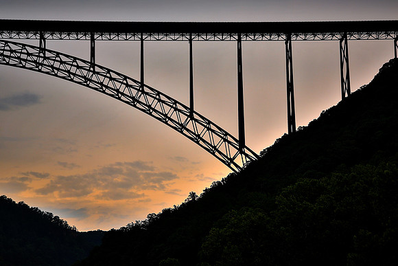 New River Gorge Bridge, WV: completed in 1977, longest steel span in western hemisphere, 876 ft high
