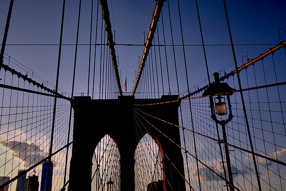 Across the Brooklyn Bridge and the East River at sunset, New York City