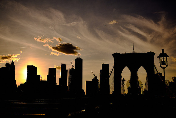 Across the Brooklyn Bridge and the East River at sunset, New York City