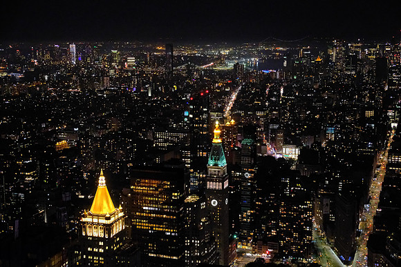New York City at night (the Brooklyn, Manhattan, Williamsburg,  and Verrazano-Narrows Bridges can be identified)