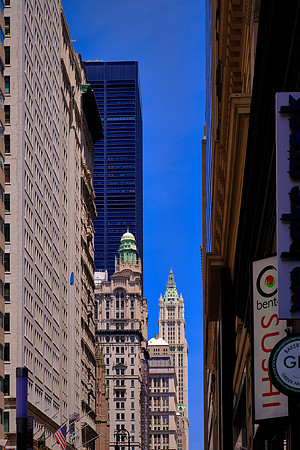 Woolworth Building (far building) from Wall Street, Lower Manhattan, New York City (construction started 1910)