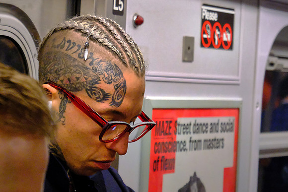 The art of the human head on the subway, New York City