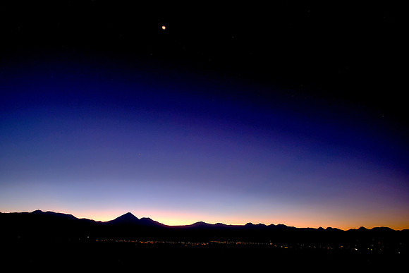 Moon set at sunrise over San Pedro de Atacama, Chile