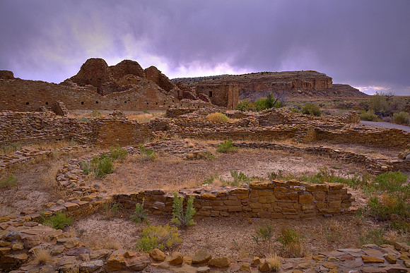 They built crescent-shaped stone complexes, each comprising four to five residential suites abutting subterranean kivas: large enclosed areas reserved for rites.