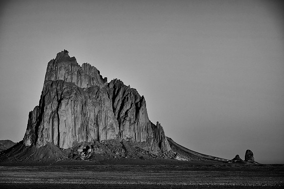 Sunrise at Shiprock: a monadnock rising 1,583 feet above the high-desert plain of the Navajo Nation, New Mexico.