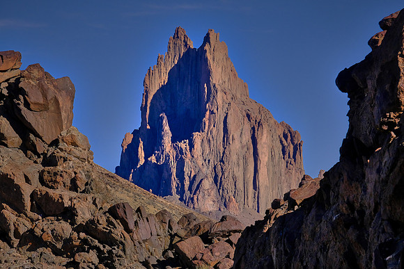 Shiprock is the erosional remnant of the throat of a volcano originally formed 3,000 feet below the Earth's surface.