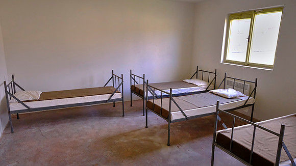 The camp included an infamous concrete cell (the bunker) where as many as 20 prisoners were imprisoned in cold, wet conditions for days.