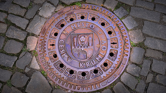 The name evolved to Krumlov.  In the 15th century, "Český" was added to distinguish it from the Moravian city, Moravský Krumlov.