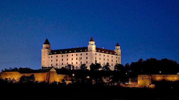 The Bratislava Castle with four corner towers stands on an isolated rocky hill of the Little Carpathians.