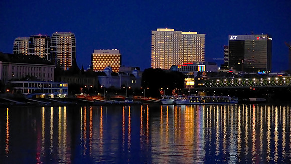Bratislava over the Danube River at sunset.