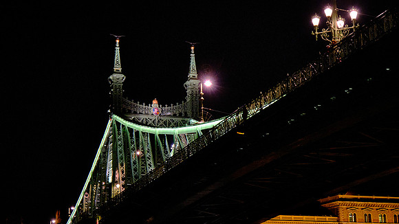 Liberty Bridge is a three-span girder bridge with a Gerber truss built in Art Nouveau style.