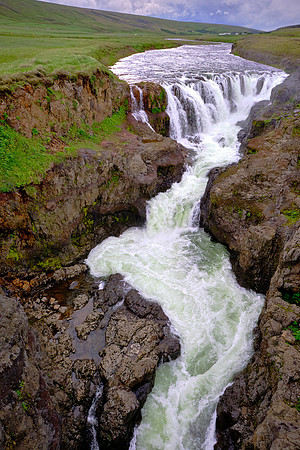 Kolugljufur Canyon is 0.6 miles long, 200 feet wide, and 130 feet deep.
