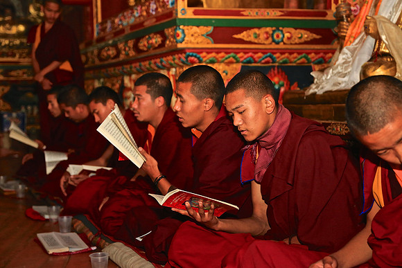 Monks in prayer session, Boudhanath Stupa, Kathmandu, Nepal