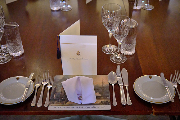 Placement of all silverware is measured with a ruler.