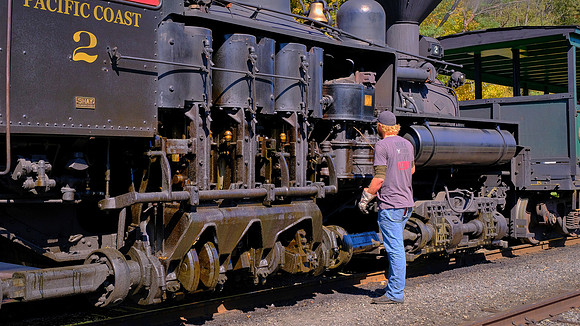 A high ratio of piston strokes to wheel revolutions allowed them to run at partial slip, where a conventional rod engine would spin its drive wheels and burn rails, losing all traction.