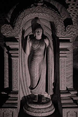 The temple also includes statues of the Hindu deities, Vishnu and Ganesh.