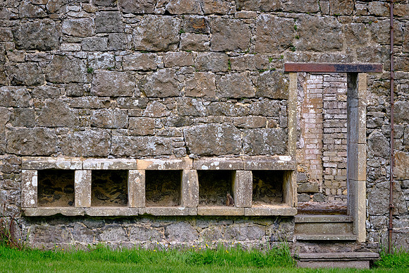 The castle wall had 5 south-facing bee hives to facilitate beeswax production.  Beeswax burns cleaner than whale oil.