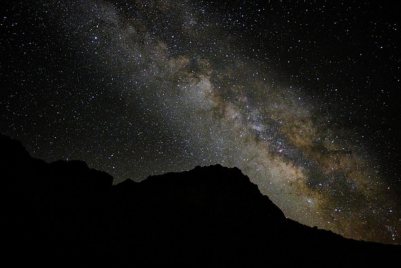 The Milky Way over Capitol Reef National Park, UT.  The Milky Way is a barred spiral galaxy with an estimated visible diameter of 100,000–200,000 light-years.