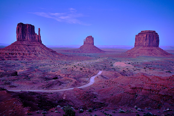 Monument Valley, UT, West Mitten Butte, East Mitten Butte, and Merrick Butte after sunset. Blue hour light has a special character.