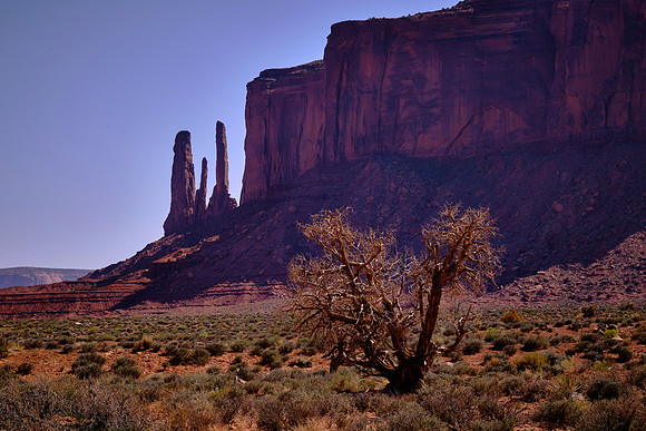 Monument Valley, UT, and the Three Sisters (Jessica, Leslie, & Andrea).  Natural forces of wind and water spent the last 50 million years cutting into the plateau.