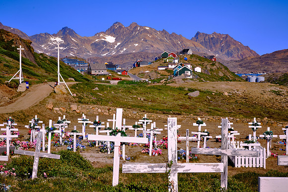 Simple white, wooden crosses are typical of cemeteries throughout Greenland.
