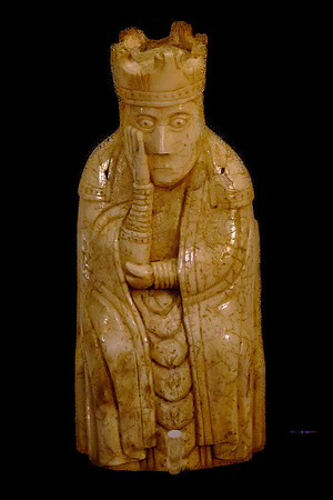 The Lewis chessmen are 12th-century chess pieces carved from walrus ivory.
