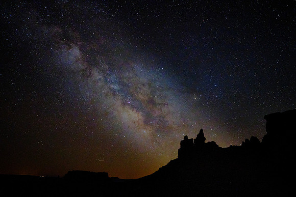 The Milky Way over the Valley of the Gods, UT.  After the water receded, the iron in the rocks mixed with oxygen to form rust resulting in the rich red and purple colors seen today.