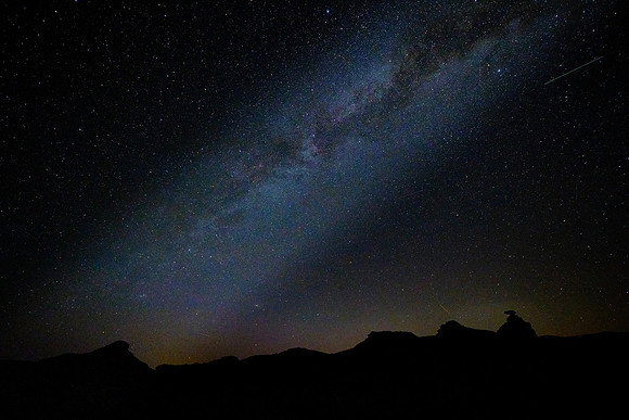 The Milky Way over Mexican Hat, UT. The rock measures 60 feet across and 12 feet thick (lower right).