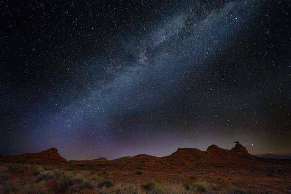 The Milky Way over Mexican Hat, UT. The rock measures 60 feet across and 12 feet thick (lower right).  Some estimates number of stars in the Milky Way between 100 and 400 billion.