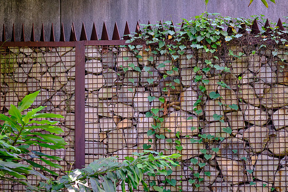 Surrounding the park is a wall made of the rubble from the high-rise apartment building where Pablo lived.